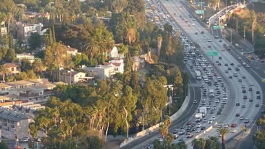 忙冲小时城际高速公路大都市这些洛杉矶加州美国城市交通小时路阳光空中视图汽车多个车道车道高速公路汽车城市